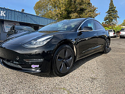 Key #4 Tesla Model 3 Mid Range Sedan 4D