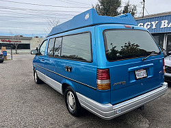 Key #46 Ford Aerostar Pop Top Camper