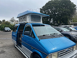 Key #46 Ford Aerostar Pop Top Camper