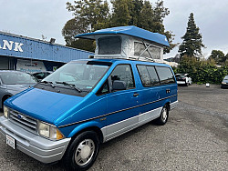 Key #46 Ford Aerostar Pop Top Camper