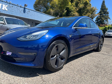 Key #23 Tesla Model 3 Mid Range Sedan 4D