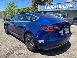 Key #23 Tesla Model 3 Mid Range Sedan 4D