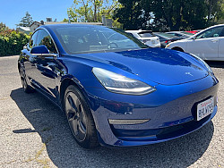 Key #23 Tesla Model 3 Mid Range Sedan 4D