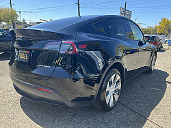 Key #134 Tesla Model Y Long Range Sport Utility 4D